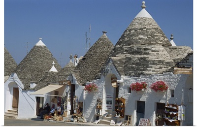 Conical roofs and whitewashed walls of Trullis in Alberobello, Puglia, Italy