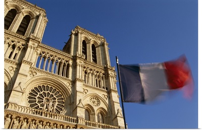 French flag and Notre Dame de Paris, Christian cathedral, Paris, France