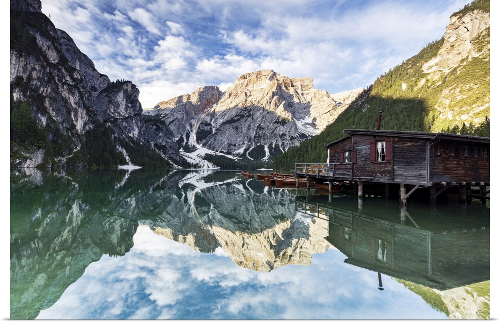 Lake Braies (Pragser Wildsee) at sunrise with Croda del Becco mountain reflected in water, Dolomites, South Tyrol, Italy, ...