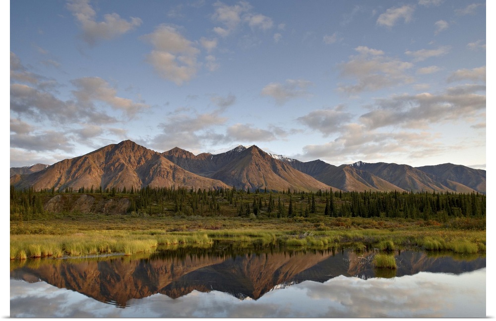 Mountains reflected in a pond along the Denali Highway, Alaska, United States of America, North America