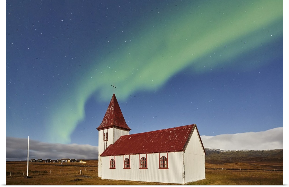 Night sky and Northern Lights (Aurora Borealis) over the church in the village of Hellnar, in Snaefellsjokull National Par...