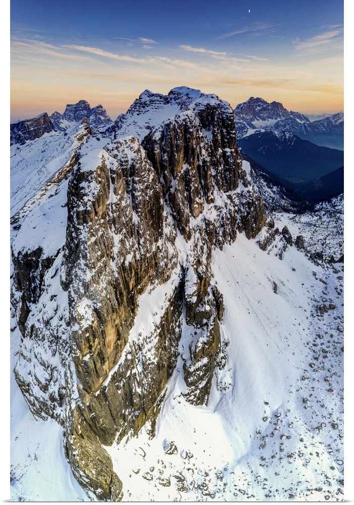 Aerial panoramic of majestic Nuvolau, Monte Pelmo and Civetta covered with snow at sunset, Dolomites, Veneto, Italy, Europe