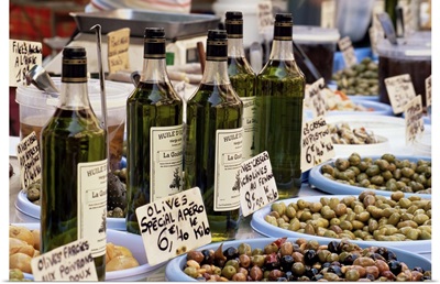 Olives and olive oil on sale at a market, Cassis, Provence-Alpes-Cote-d'Azur, France