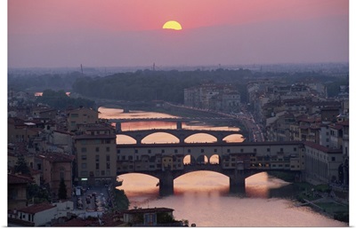 Ponte Vecchio over the River Arno at sunset in the city of Florence, Tuscany, Italy