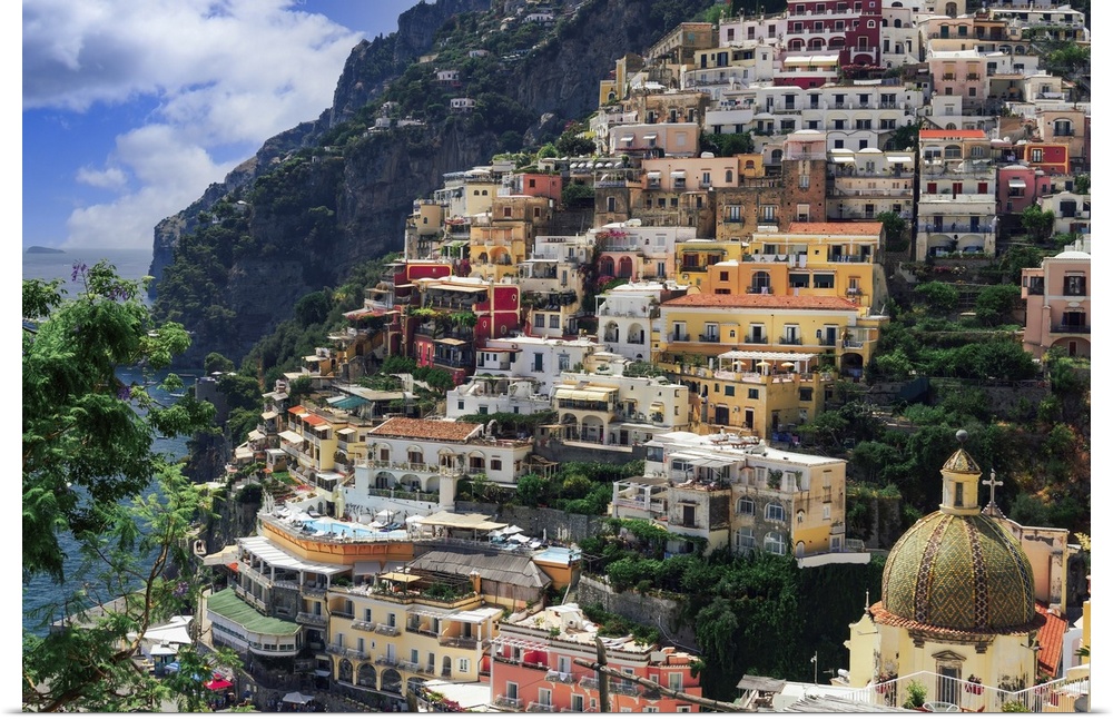 Positano town hill view with low rise colorful buildings above the sea line, Positano, Amalfi Coast, UNESCO World Heritage...