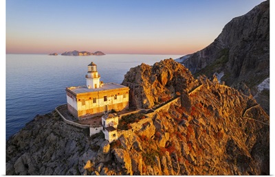 Punta Della Guardia Lighthouse On Top Of A Cliff On The Island Of Ponza, Italy