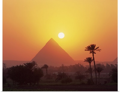 Pyramid silhouetted at sunset, Giza, Cairo, Egypt, Africa