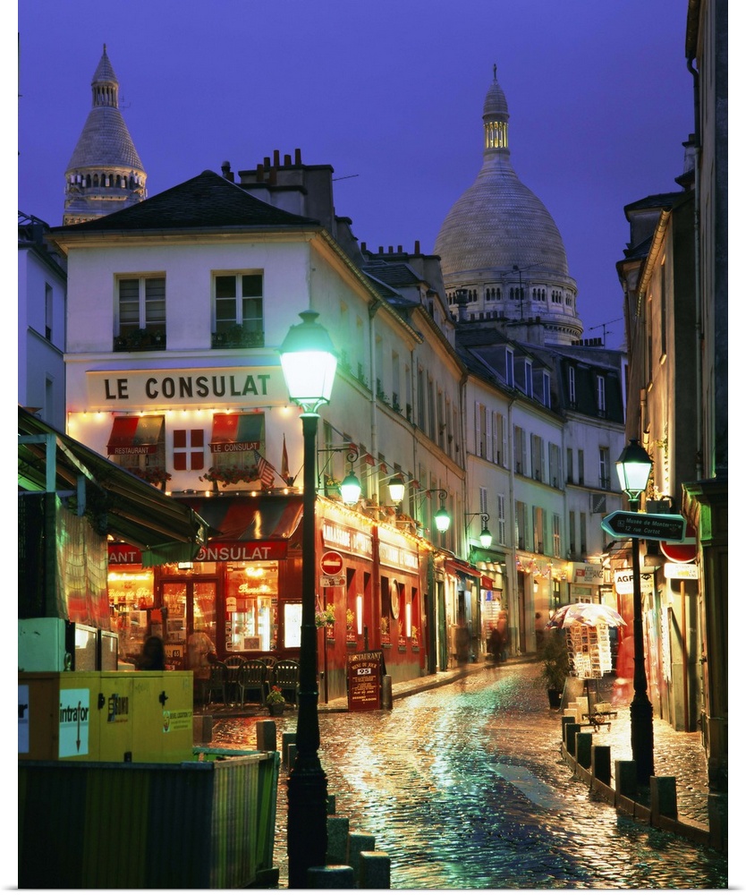 Rainy street and dome of the Sacre Coeur, Montmartre, Paris, France