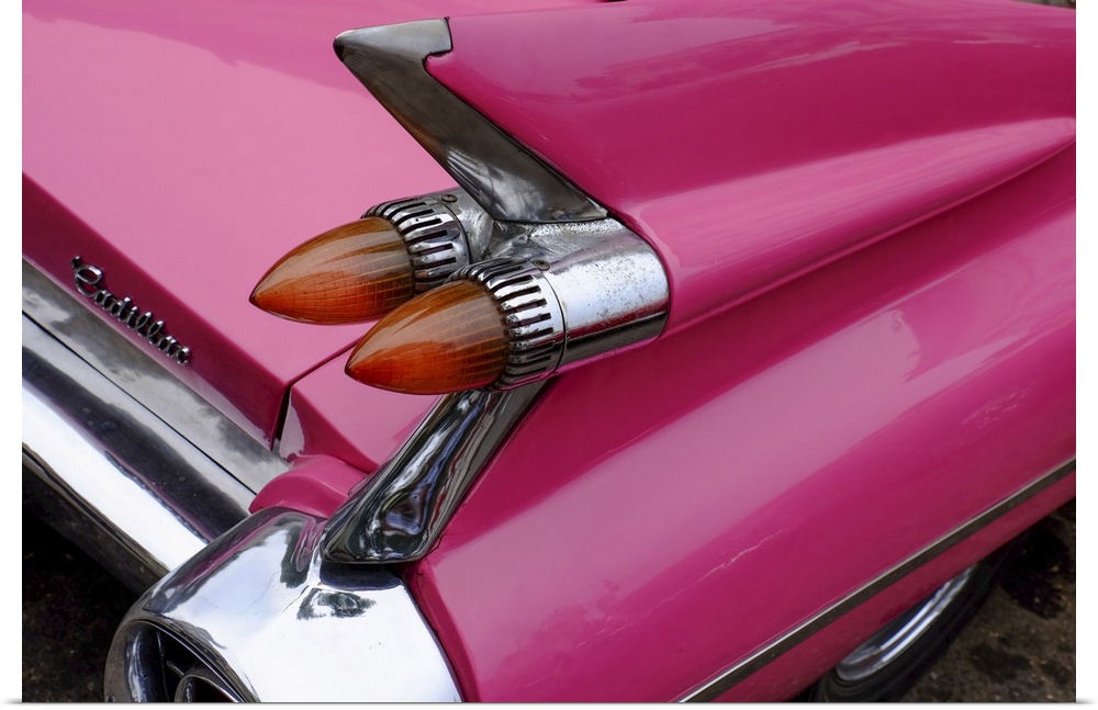Rear fin and lights of vintage pink Cadillac, Havana, Cuba, West Indies, Central America