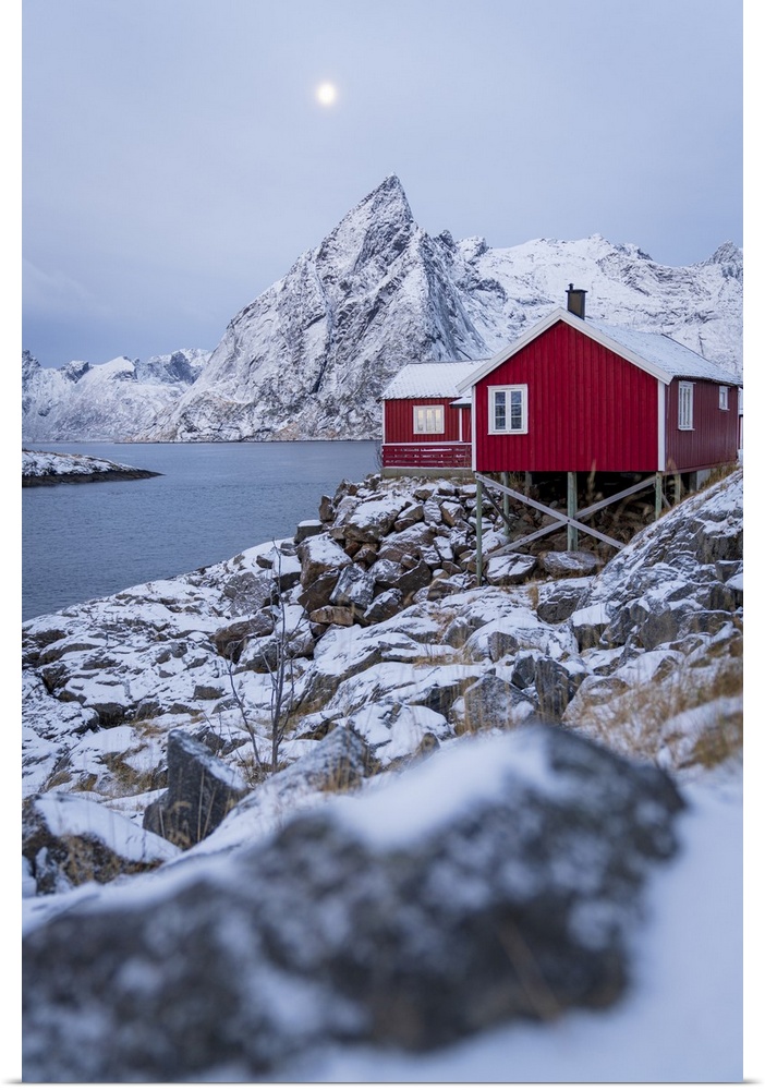 Red fishermen's cabins covered with snow at dusk, Hamnoy, Nordland county, Lofoten Islands, Norway, Scandinavia, Europe