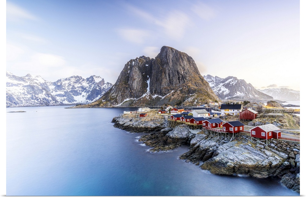 High angle view of traditional red Rorbu cabins in the fishing village of Hamnoy at dawn, Reine, Lofoten Islands, Norway, ...
