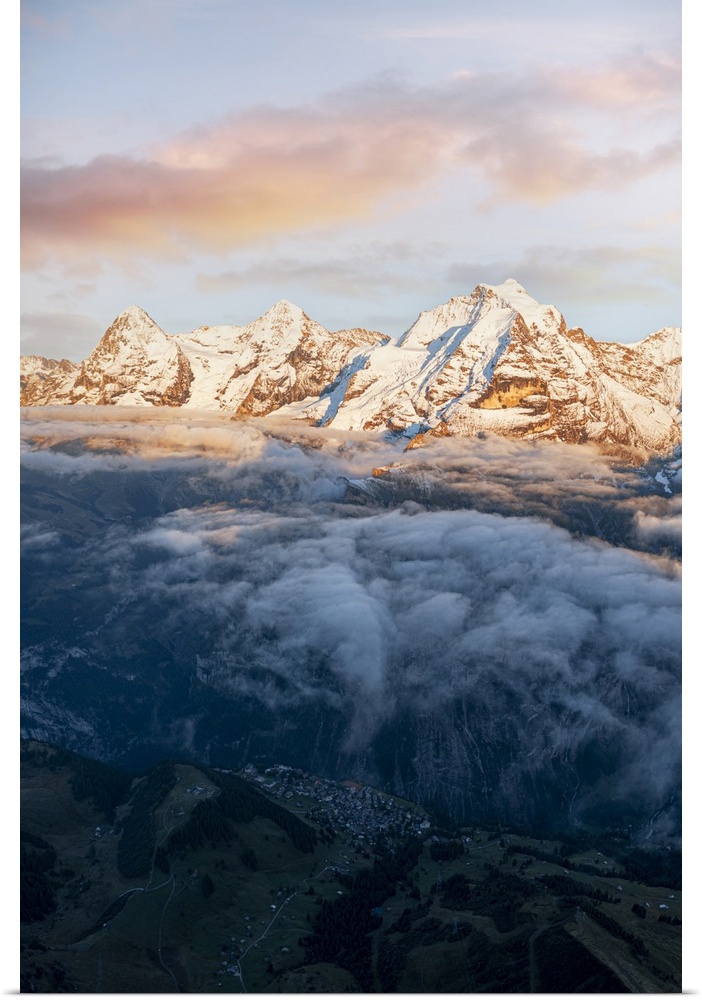 Aerial view of snowcapped peaks of Eiger, Monch and Jungfrau in fog at sunset, Murren Birg, Jungfrau Region, Bern, Swiss A...