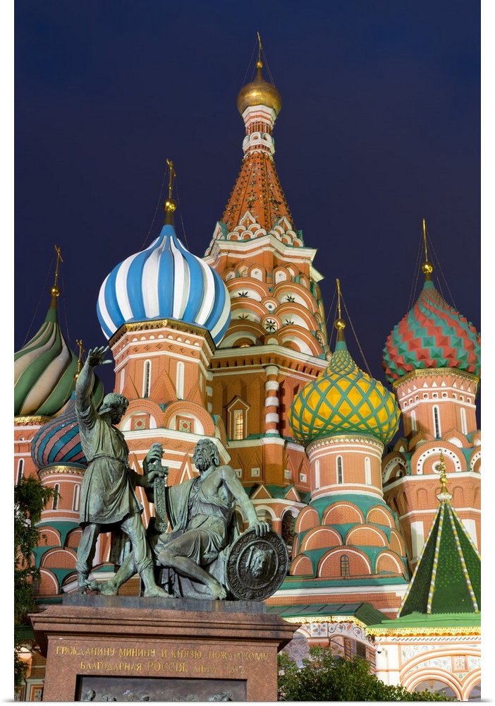 St. Basil's Cathedral and the statue of Kuzma Minin and Dmitry Posharsky lit up at night, Moscow, Russia