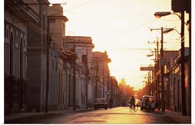 Street scene at sunrise, Cienfuegos, Cuba, West Indies, Central America