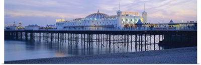 The beach and Palace Pier, Brighton, East Sussex, England, UK