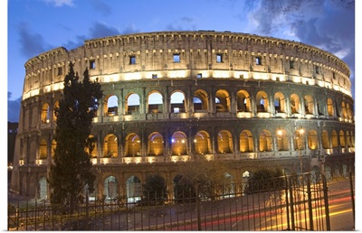 The Colosseum at night with traffic trails, Rome, Lazio, Italy