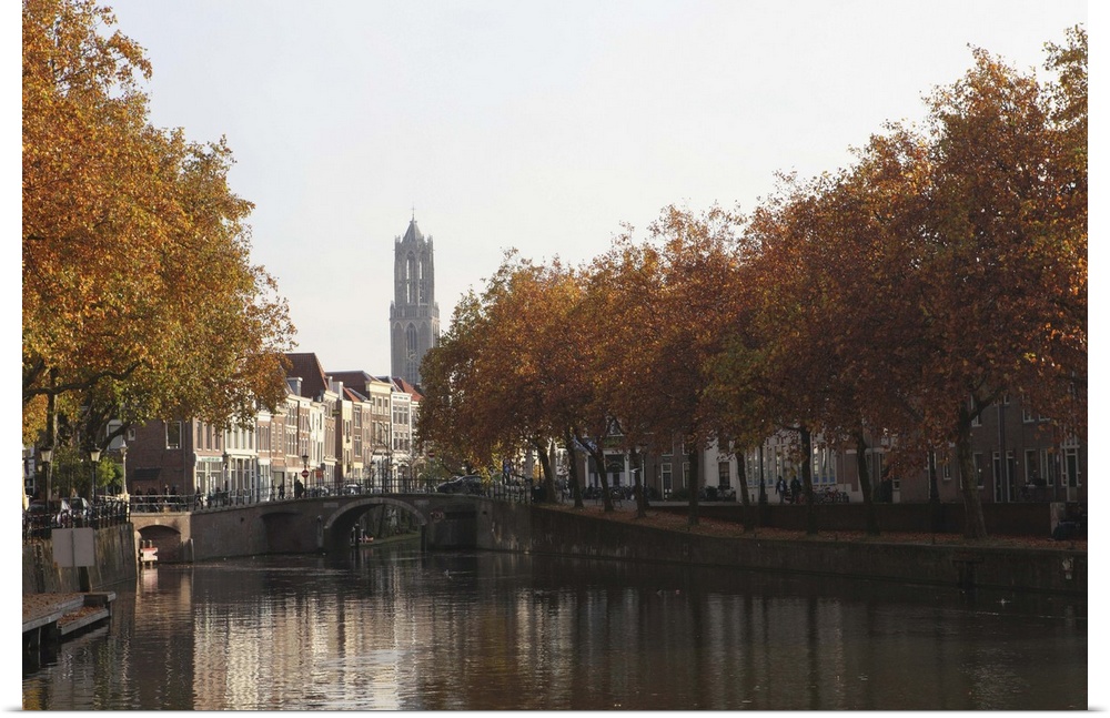 The Dom Tower and canal waterway on an autumn day, Utrecht, Netherlands