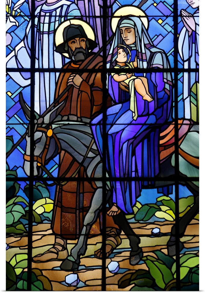 Stained glass window of the Flight into Egypt, in Chedde church, Haute Savoie, France, Europe.