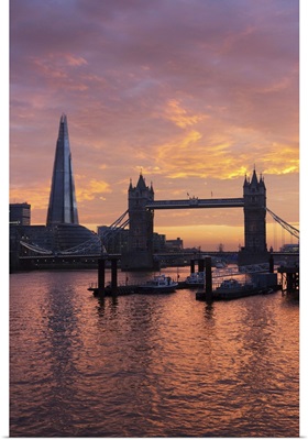 The Shard and Tower Bridge on the River Thames at sunset, London, England