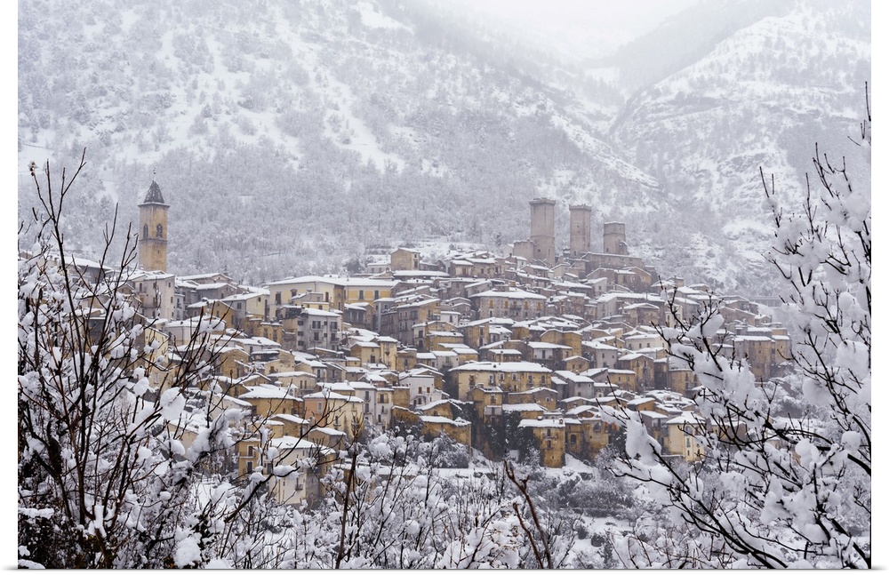View of the village and the castle of Pacentro under heavy snowfall, Maiella National Park, L'Aquila province, Abruzzo, It...