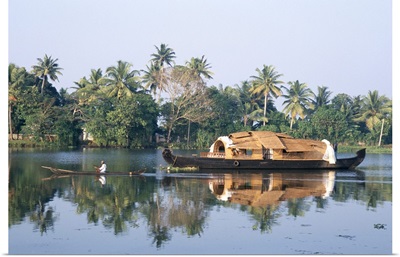 Tourists' rice boat on the backwaters near Kayamkulam, Kerala, India, Asia