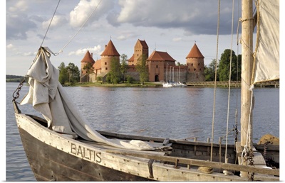 Traditional boat and Trakai Castle, Trakai, near Vilnius, Lithuania, Baltic States