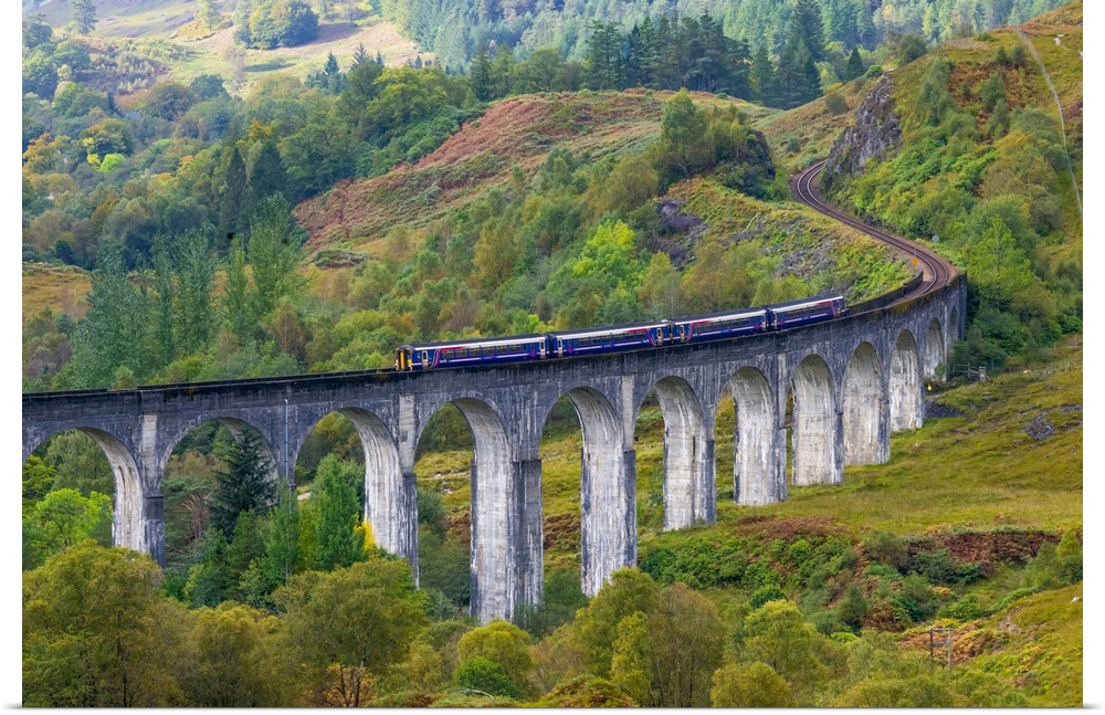 Train on the Glenfinnan Railway Viaduct, part of the West Highland Line, Glenfinnan, Loch Shiel, Highlands, Scotland, Unit...