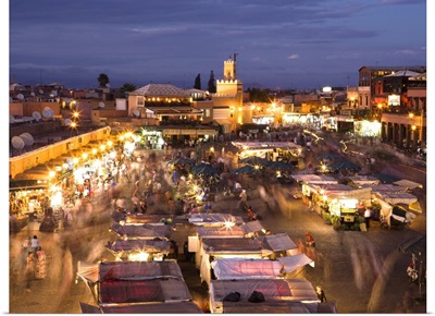 View Over Djemaa El Fna At Dusk With Foodstalls And Crowds Of People, Marrakech, Morocco