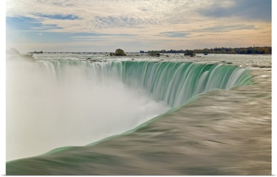 Water at the top of the Horseshoe Falls on the Niagara River, Ontario, Canada