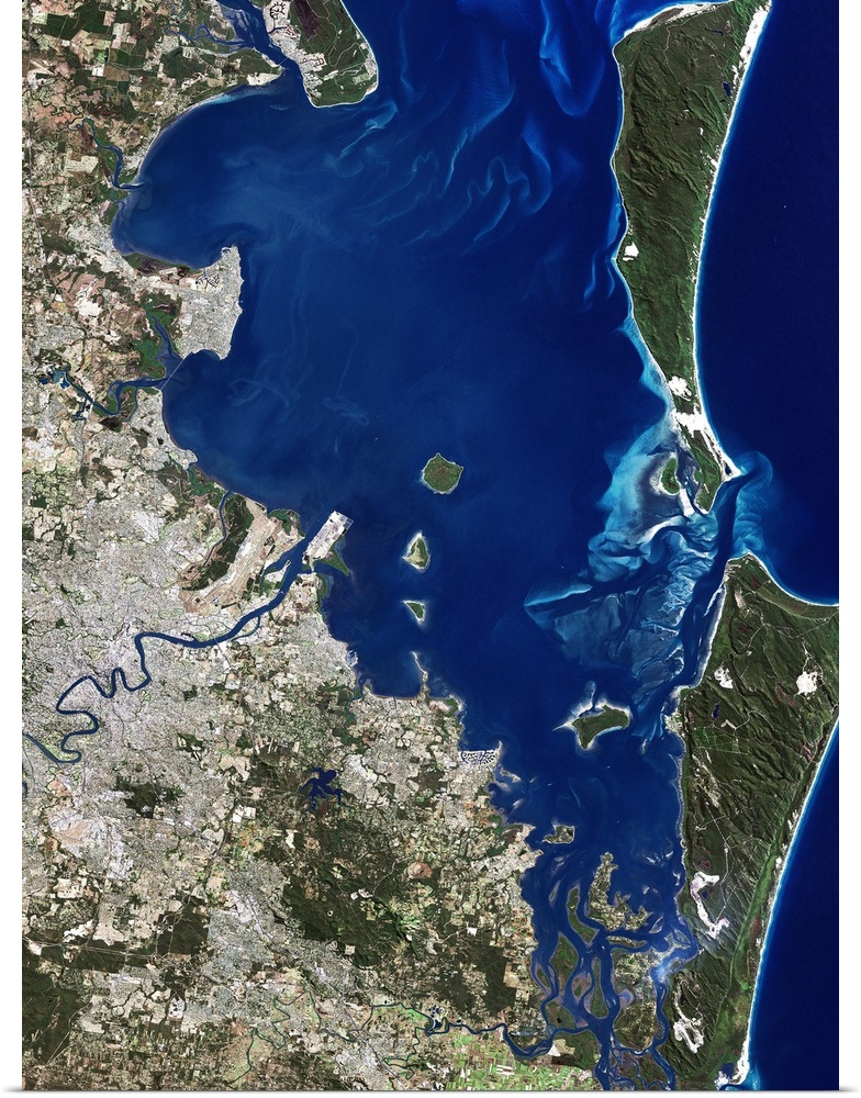 Brisbane, Australia, satellite image. North is at top, water is blue, shallow coastal areas are light blue, urban areas ar...