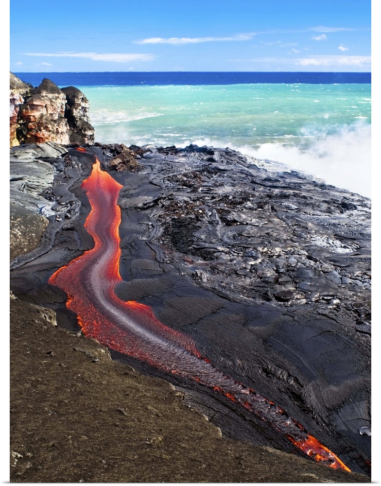 Lava flowing into the Pacific Ocean.
