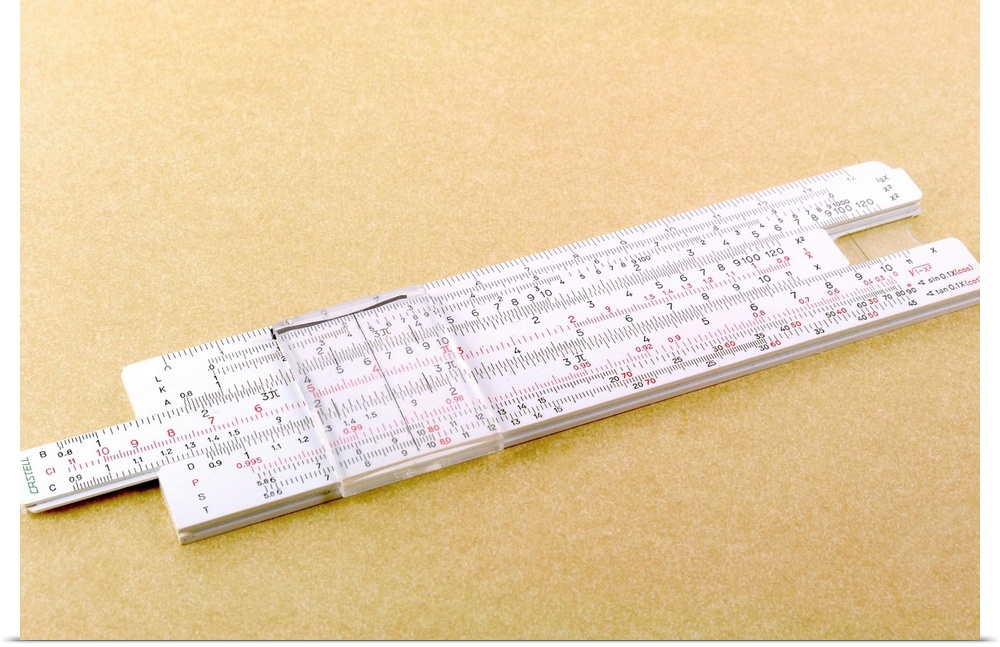 Logarithmic slide rule. This adjustable ruler contains the values for logs, which are used to aid multiplication and divis...