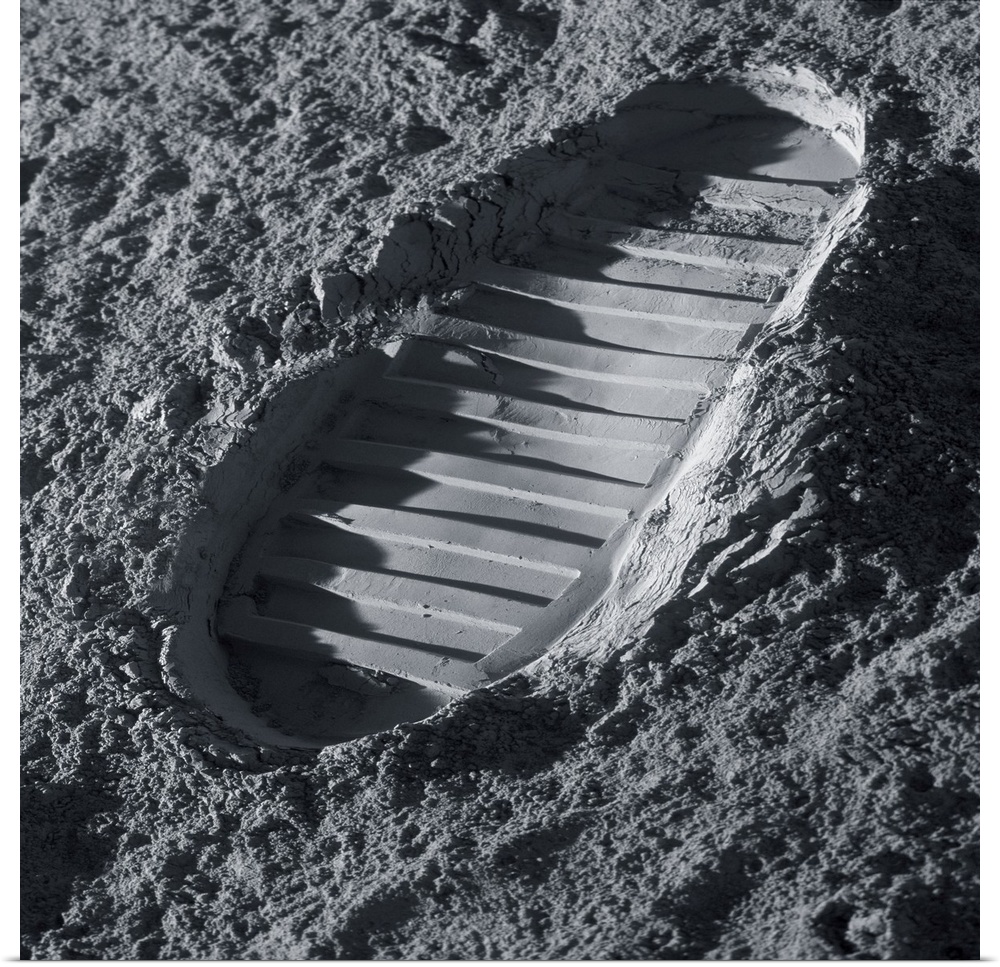 Walking on the Moon. Computer illustration of an astronaut's bootprint on the surface of the Moon.