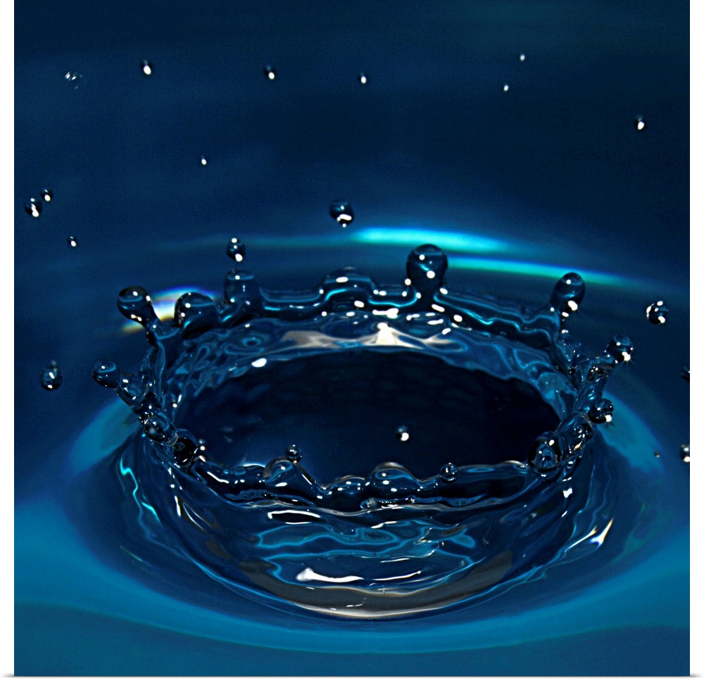 Water drop impact on water surface.