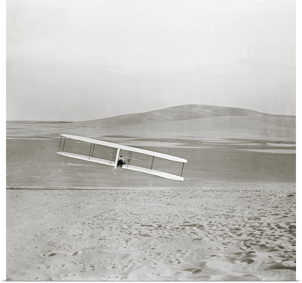 Wright brothers Kitty Hawk glider. Test flight by US aviation pioneer Wilbur Wright (1867-1912) of the 1902 glider built a...