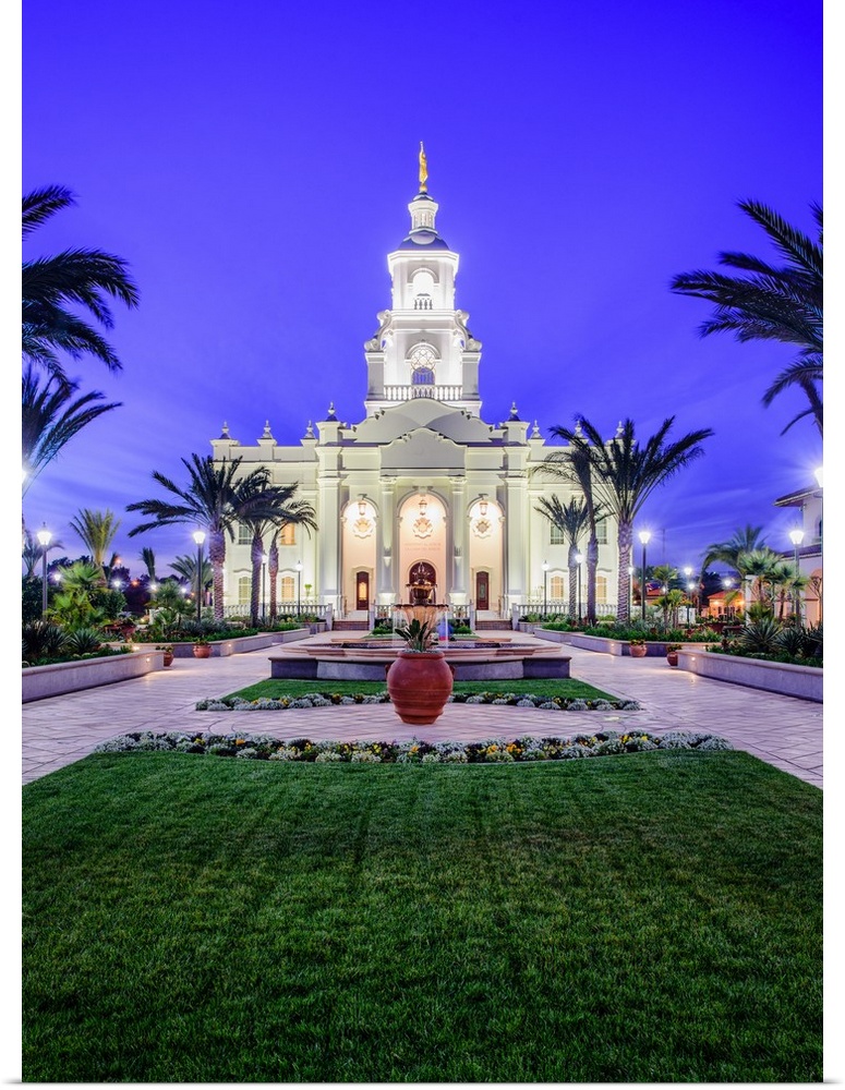 The Tijuana Mexico Temple is located in Baja California. The entrance of the temple is adorned with palm trees, a water fe...