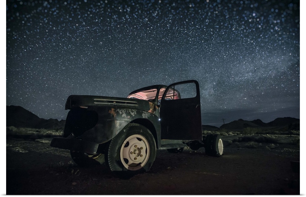 Abandoned old truck with the stars and the night sky