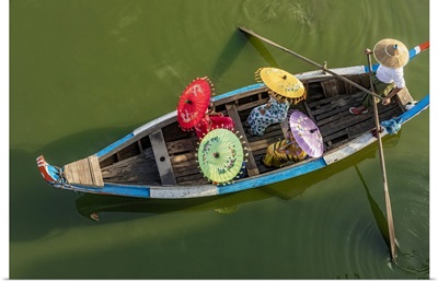 Burmese Women With Umbrellas Boating By The Ubein Bridge In Burma