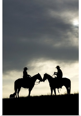 Cowboy and cowgirl silhouette at sunset, Yosemite, California
