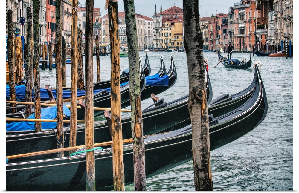 Gondolas after dark in Venice, Italy.