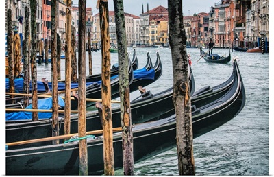 Gondolas after dark in Venice, Italy