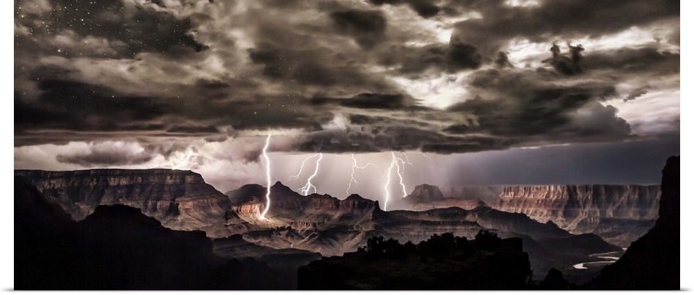 Lightning storm at night over the Grand Canyon.