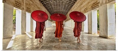 Monks walking to their monastery in Bagan, Burma