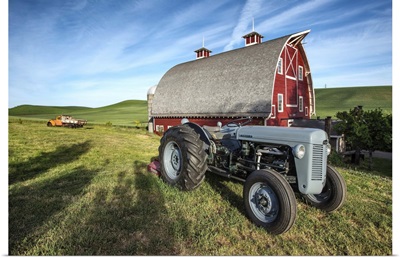 Old tractor and red barn in the Palouse, Washington