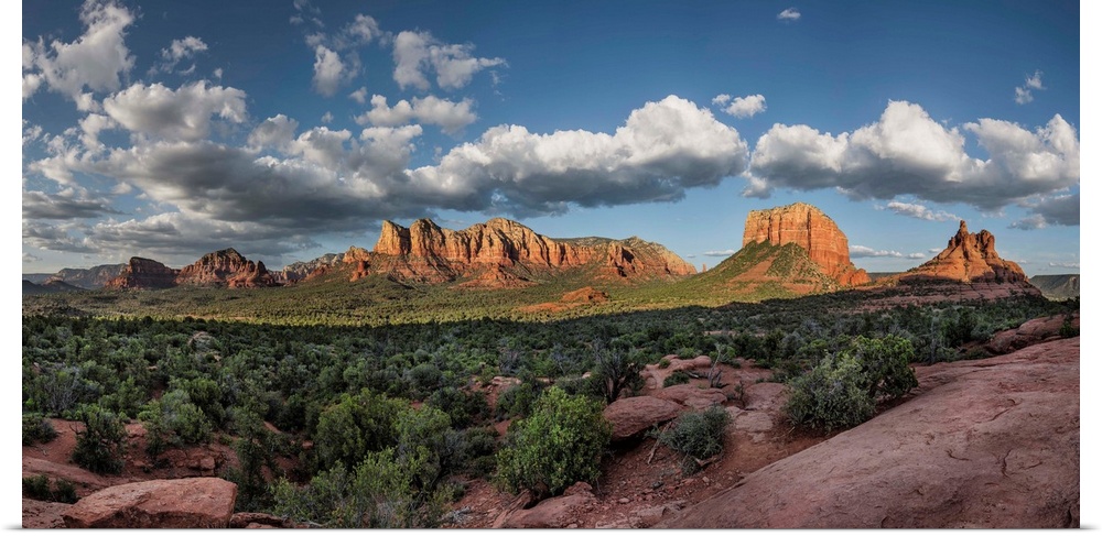 Panorama of clouds and red rocks at sunset in Sedona, Arizona.