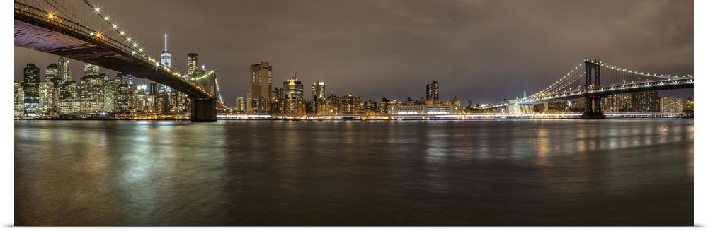 Panorama of the Brooklyn and Manhattan Bridges in NYC.