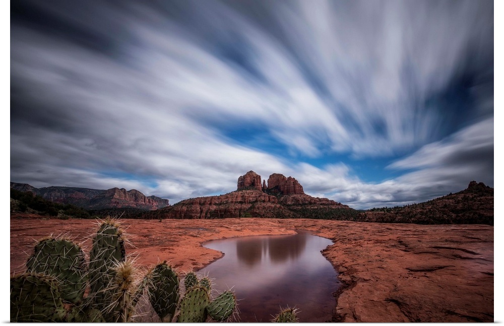 Reflection of Cathedral Rocks in water in Sedona, Arizona.