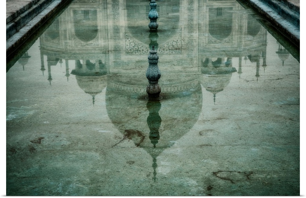 Reflection of the Taj Mahal in one of the pools.