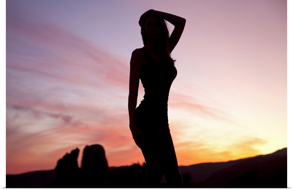Silhouette of a woman at sunset, Joshua Tree National Park, California
