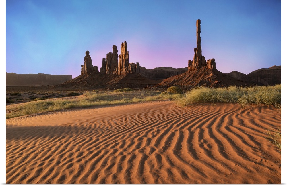 Sunrise at Totem Pole and Y'ei Bi Chei in Monument Valley, Arizona